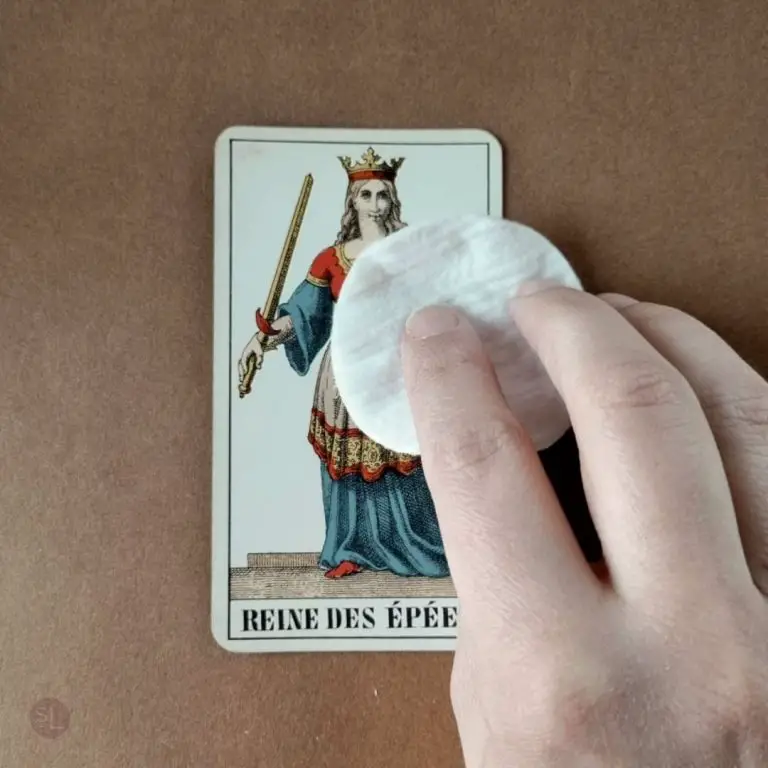 CLEAN YOUR TAROT CARDS WITH A COTTON BALL