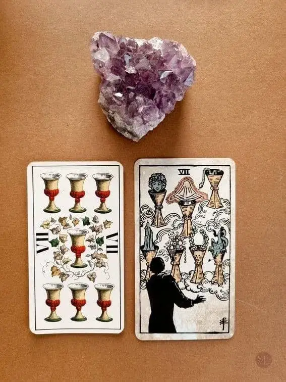 you find two tarot cards - seven Cups